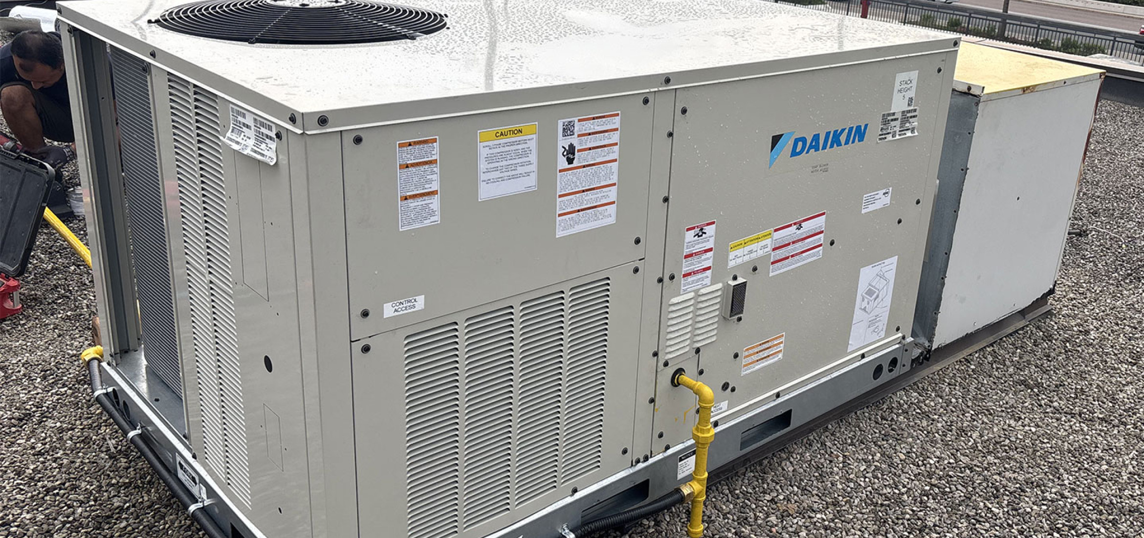 commercial-hvac-industrial-Rooftop-Estrada-Car-Rental-upgrade-Newmarket-Lennox-GCS16-to-Daikin-5-Ton-after-front-view